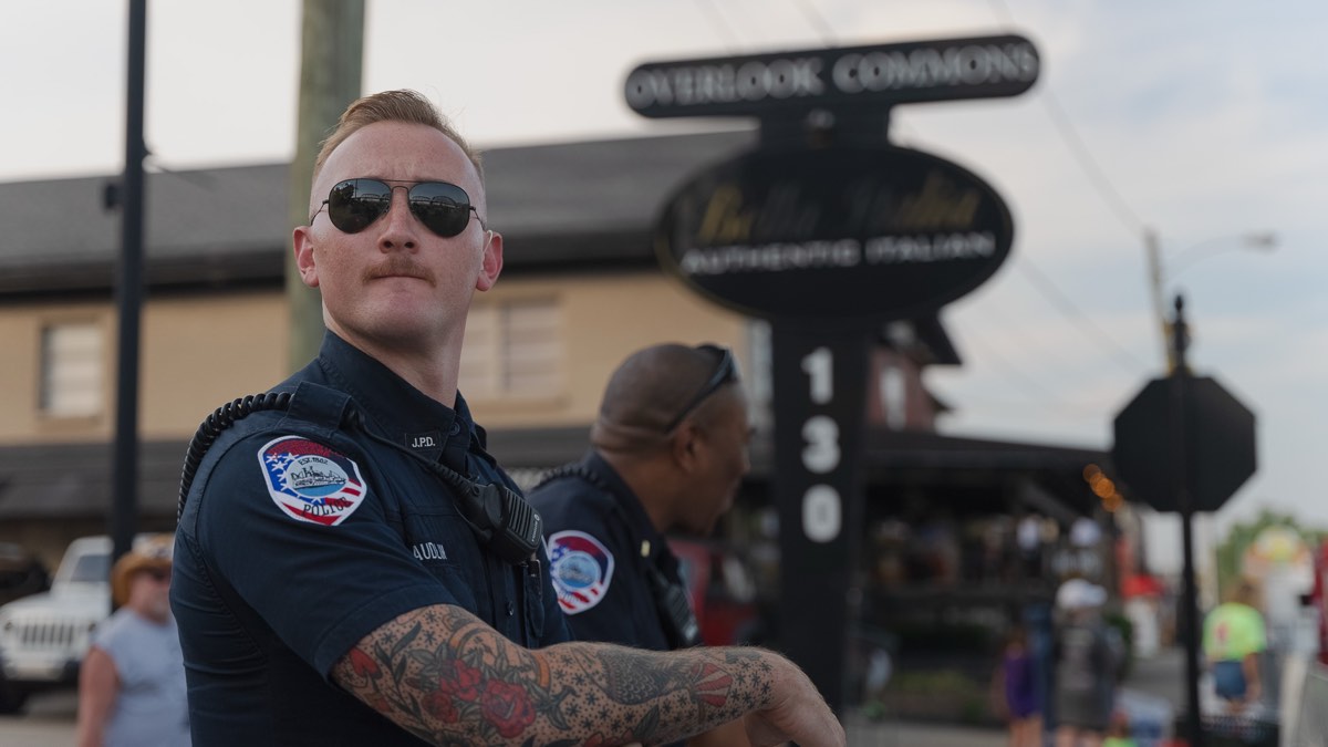 Two Jeffersonville officers on foot patrol at a street festival at Overlook Commons